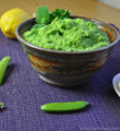 A bowl of bright green pea dip. Green Pea and Parmesan Dip.